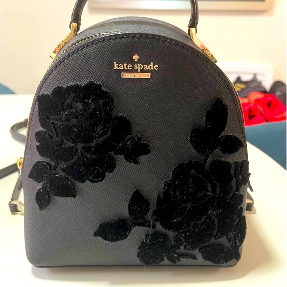 New Kate Spade Cameron street flock roses mini backpack crossbody. No tags.